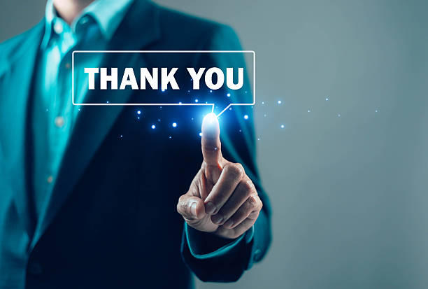 e9 Business professional pressing thank you message on digital interface, representing customer appreciation, gratitude, client relationship, positive feedback, and service satisfaction concept.