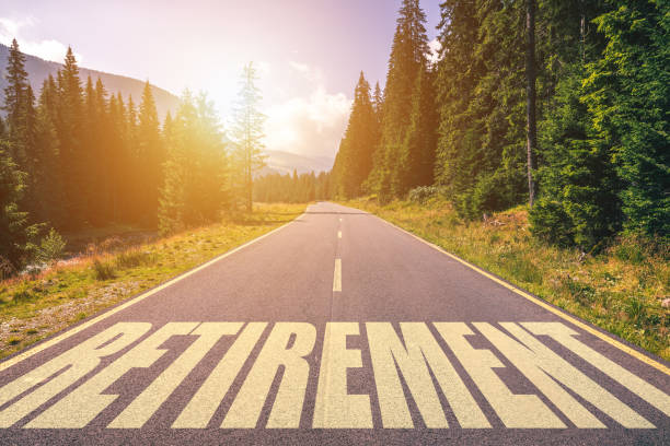 Retirement word written on road in the mountains Retirement word written on road in the mountains