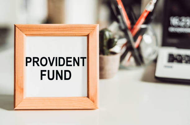 Wooden frame with office background with text PROVIDENT FUND. Wooden frame with office background with text PROVIDENT FUND.