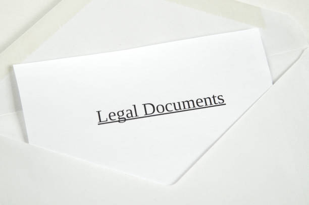 Legal Documents printed on white paper and envelope, white background Legal Documents printed on white paper and envelope, white background